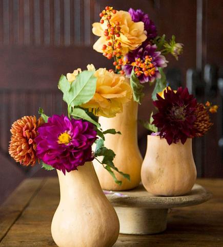 Unexpectedly lovely - these gourd vases are a lovely touch to the Thanksgiving table.