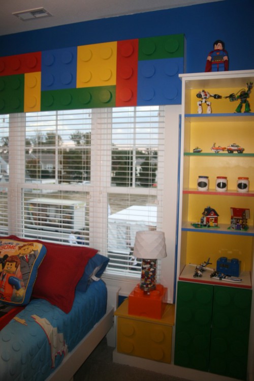 What creative kid wouldn't love this fun filled room? Legos everywhere, and yes everything about it is awesome.