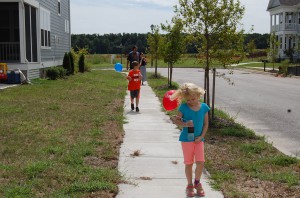 A family touring Culpepper Landing during Open House Weekend.  