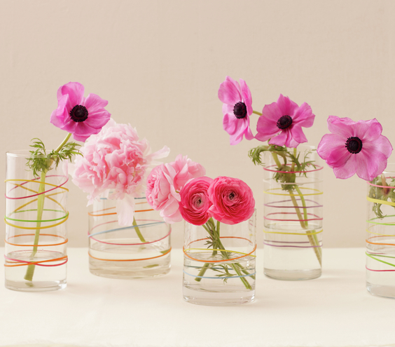 The easiest vase you'll ever make. Take water glasses and find some colorful rubber bands.